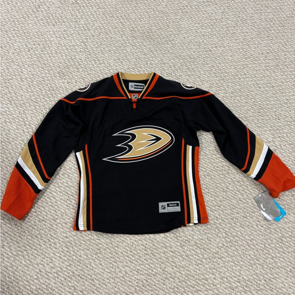 Women’s medium Anaheim Ducks Black and Orange Jersey - NWT